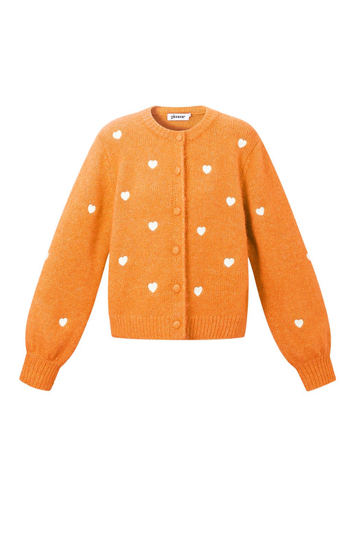 Gebreid vest met harten als cadeau voor haar