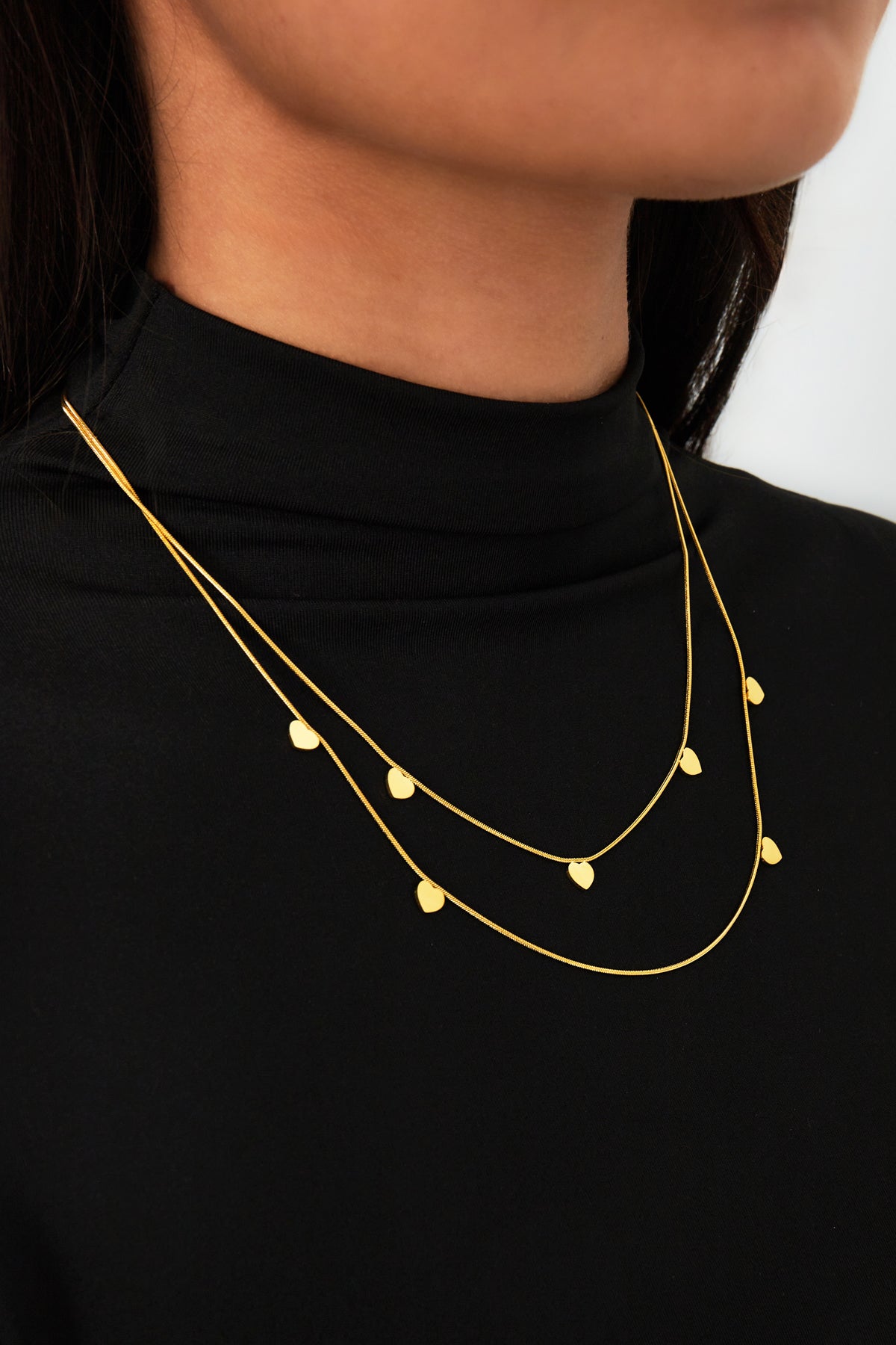 Layered stainless steel women's necklace with heart shape – gold-toned and silver-toned – image 2