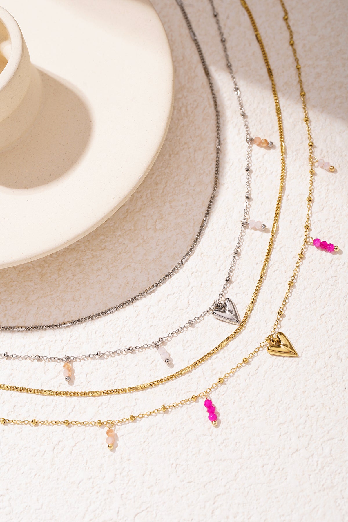 Layered women's necklace made of 304 stainless steel with a heart shape - gold colored – image 4