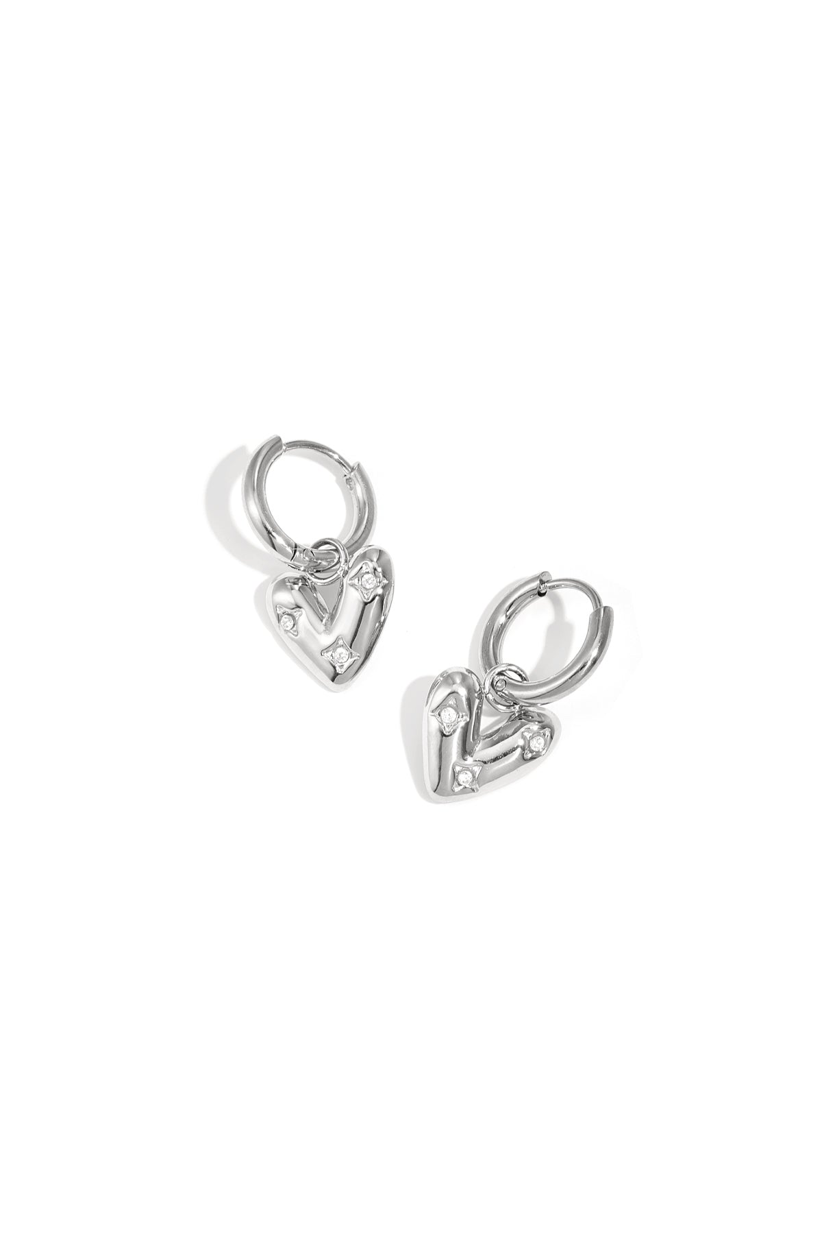 Women's stainless steel dangle earrings with heart shape - gold colored