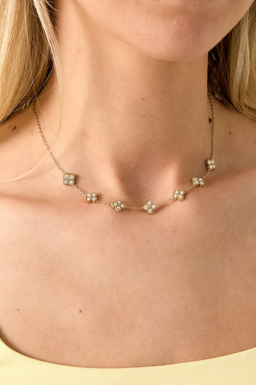 Ketting met zirkonia belegde klavers