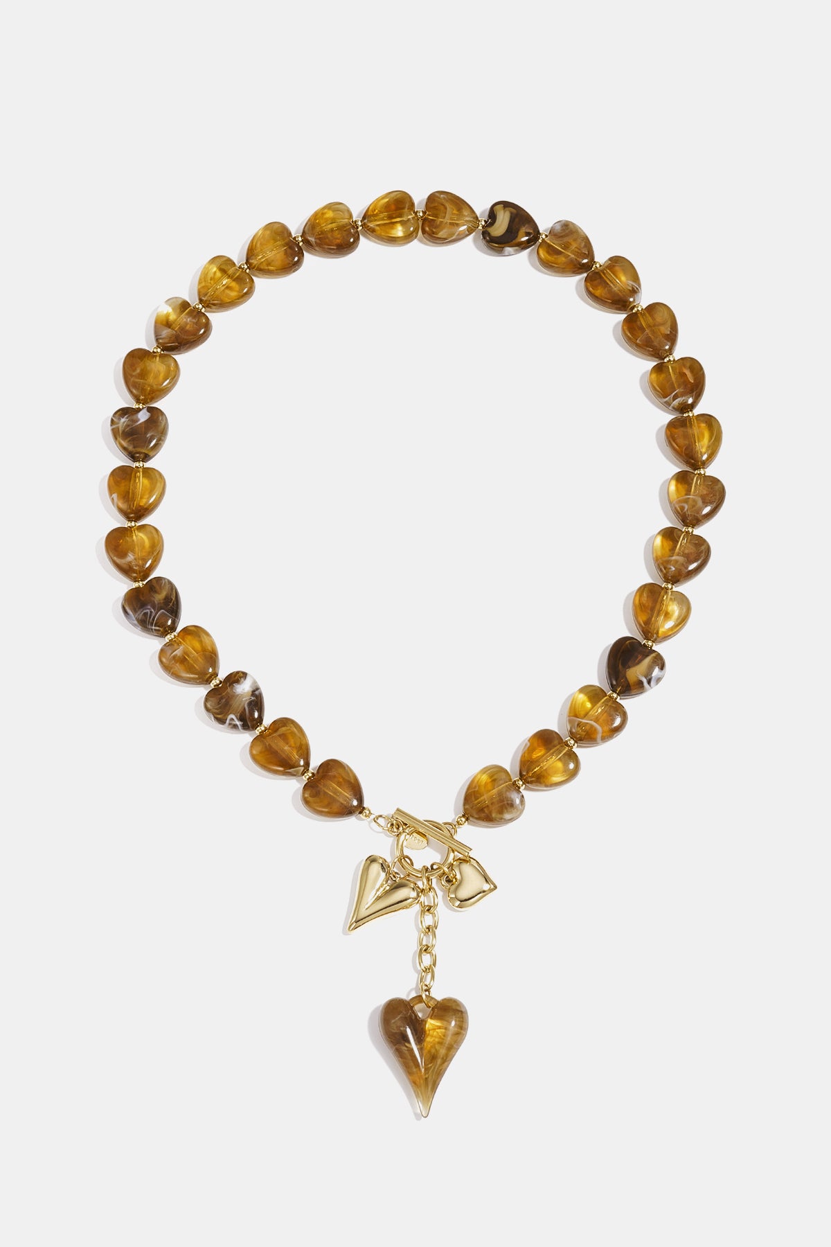 Dames kralenketting met hangende harten in oranje
