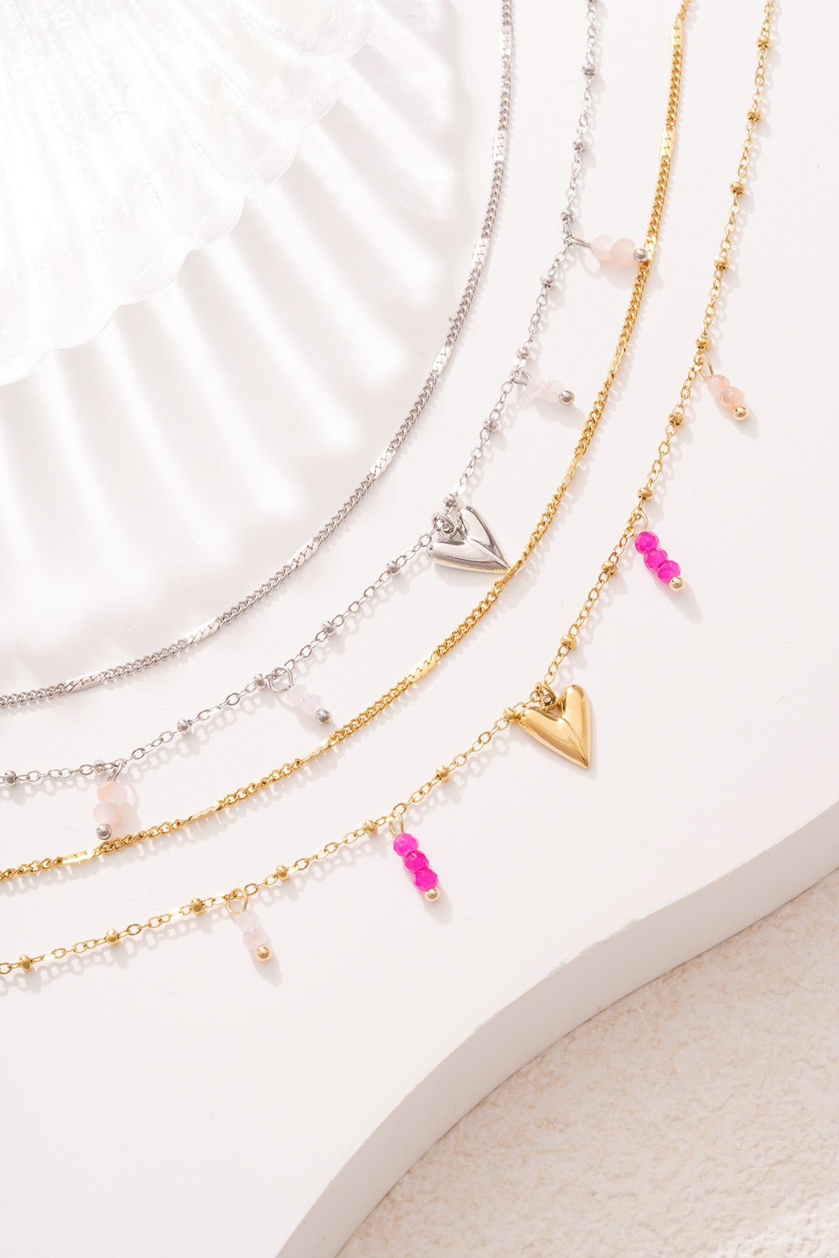 Bracelet à breloques pour femmes en acier inoxydable avec cœur – ton or et ton argent – photo 4