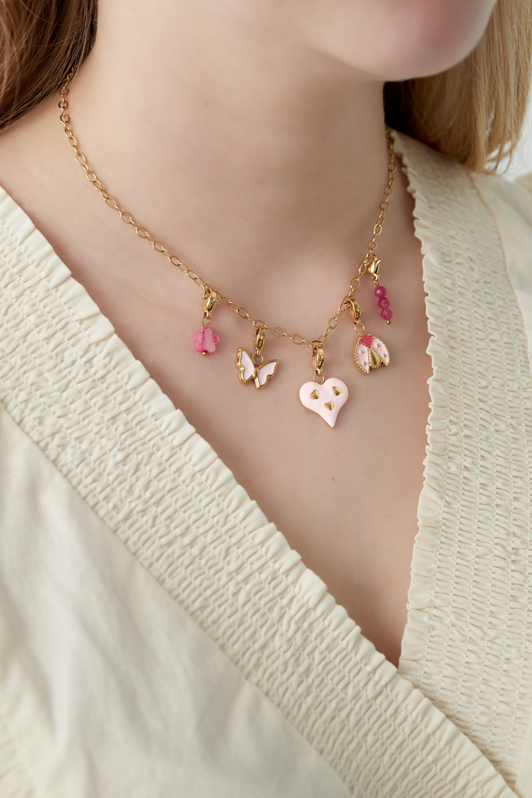 Women's necklace with pendant made of stainless steel, enamel, shell, stone with animal and floral motif – image 2