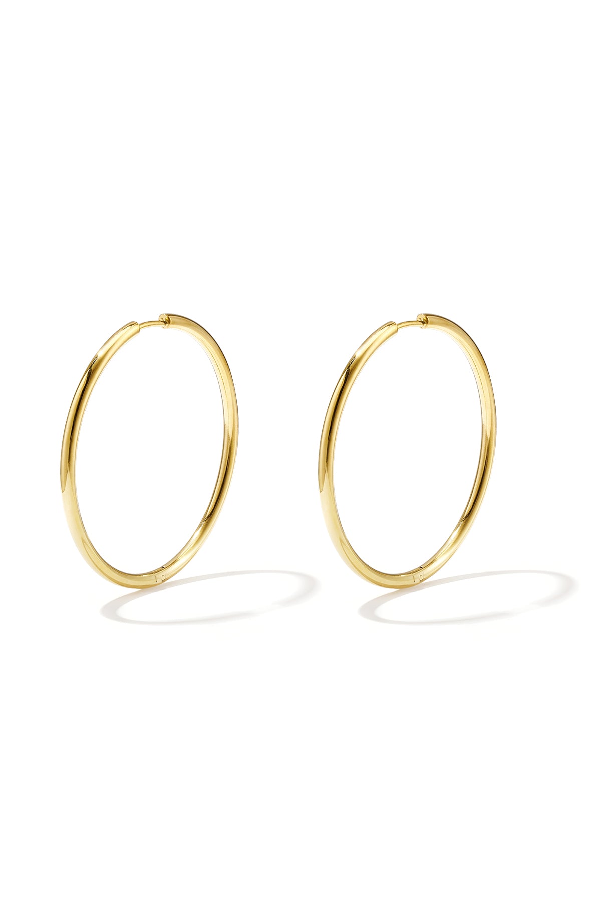 Boucles d'oreilles créoles pour femmes en acier inoxydable au design uni - couleur or
