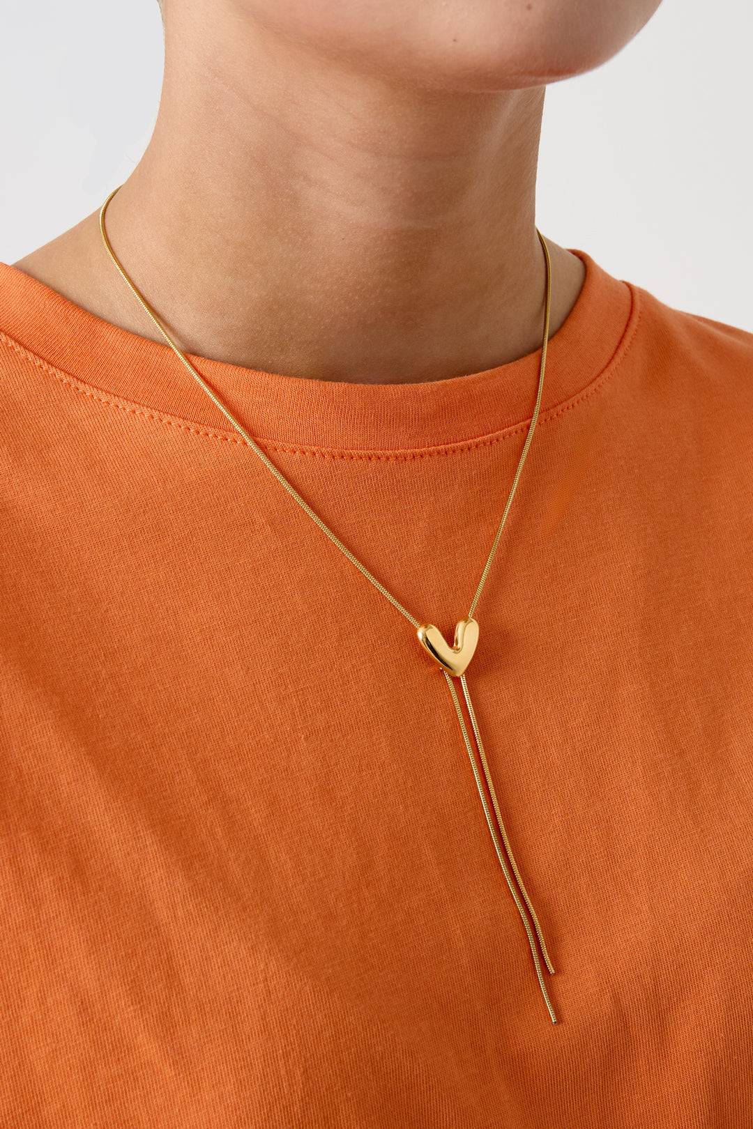 Women's necklace with heart-shaped stainless steel pendant – gold-colored and silver-colored – image 2
