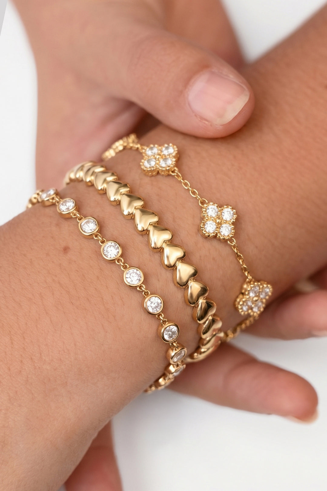 Armband met zirkonia belegde klavers