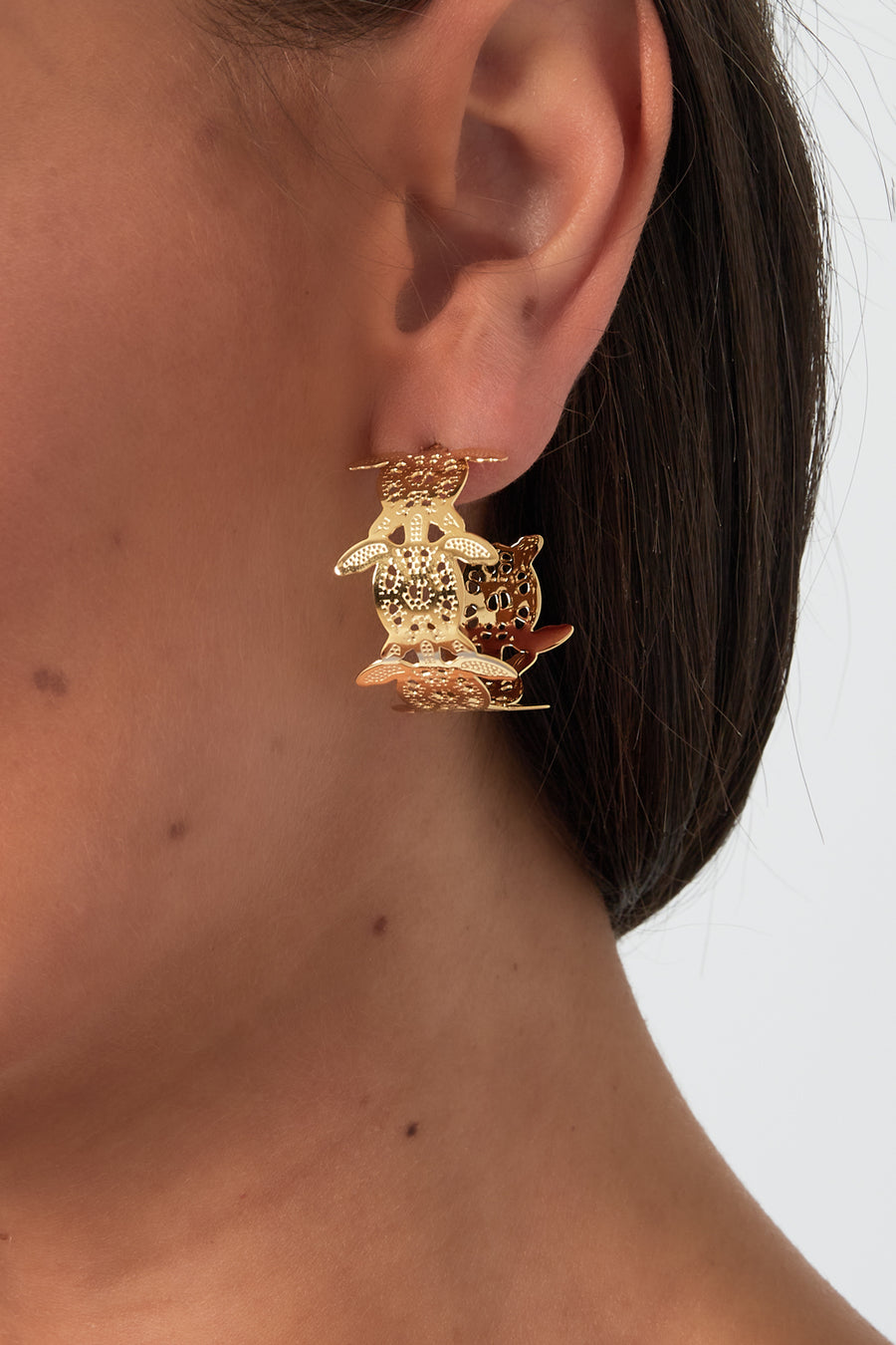 Boucles d'oreilles créoles pour femmes en acier inoxydable avec détails océaniques – doré
