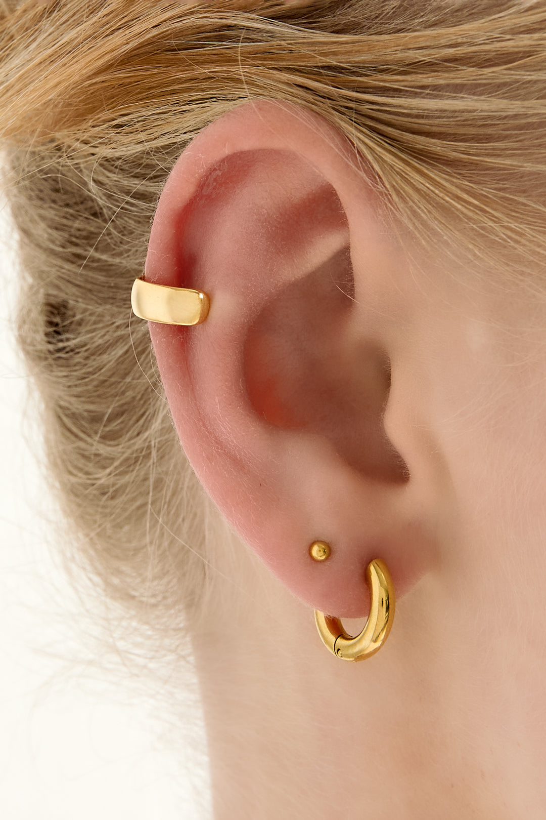 Copper ear cuff for women with organic shape – gold-coloured and silver-coloured – image 2