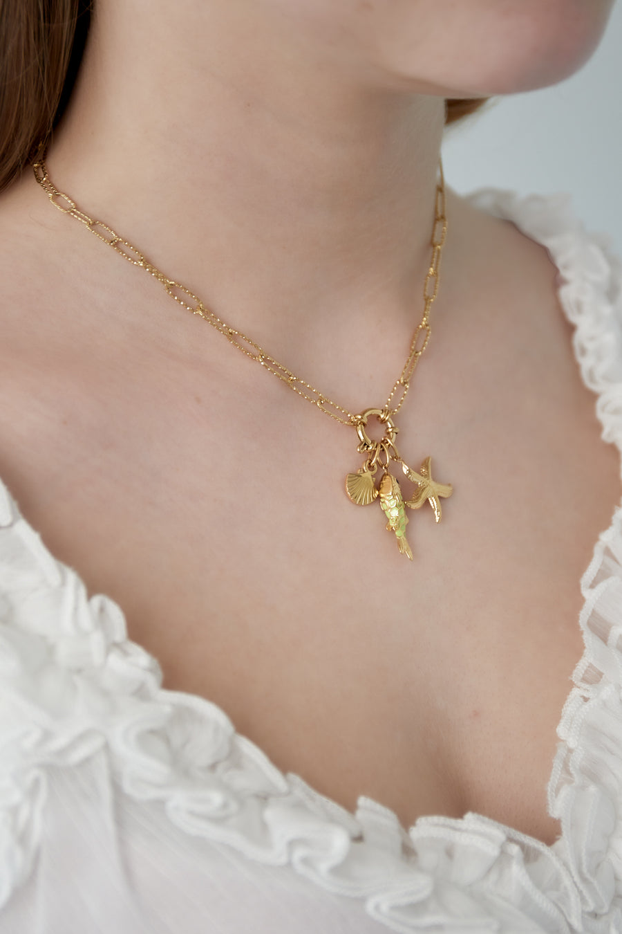Collier pour femme avec pendentif en acier inoxydable, coquillage, émail avec motif poisson et motif étoile de mer