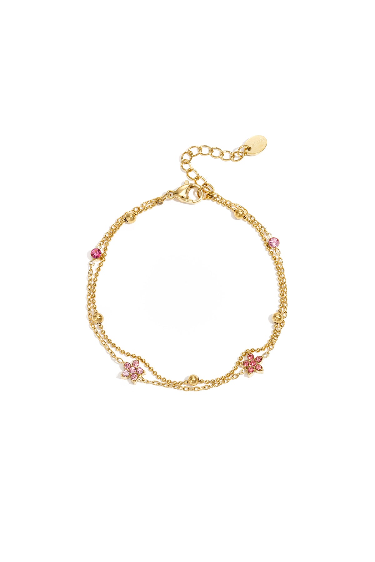 Armband met gekleurde steentjes belegde bloemetjes