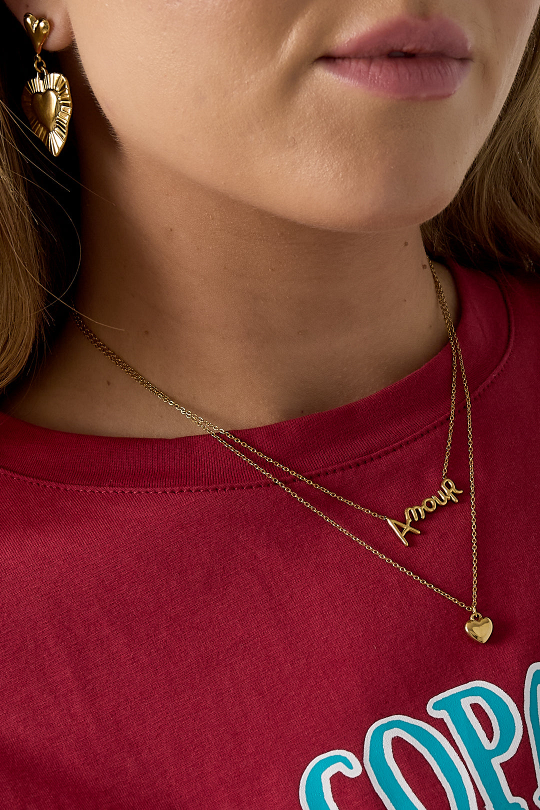 Layered stainless steel women's necklace with initial detail and heart shape – image 3