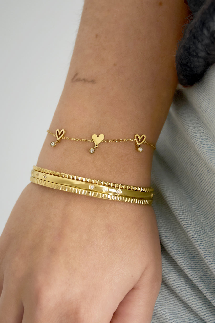 Bracelet à maillons pour femme en acier inoxydable avec cœur – doré
