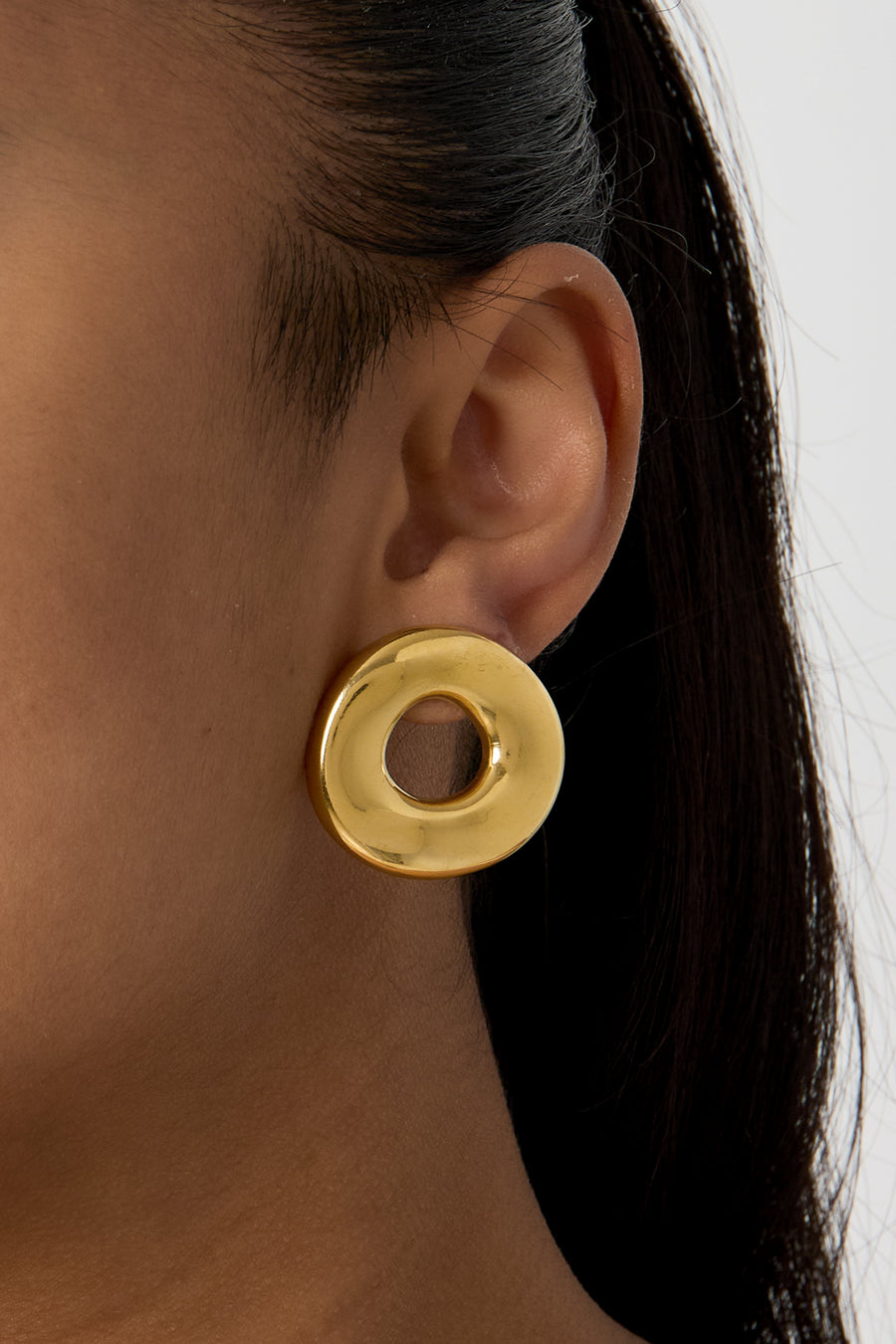 Stainless steel stud earrings for women with a round shape - gold-colored