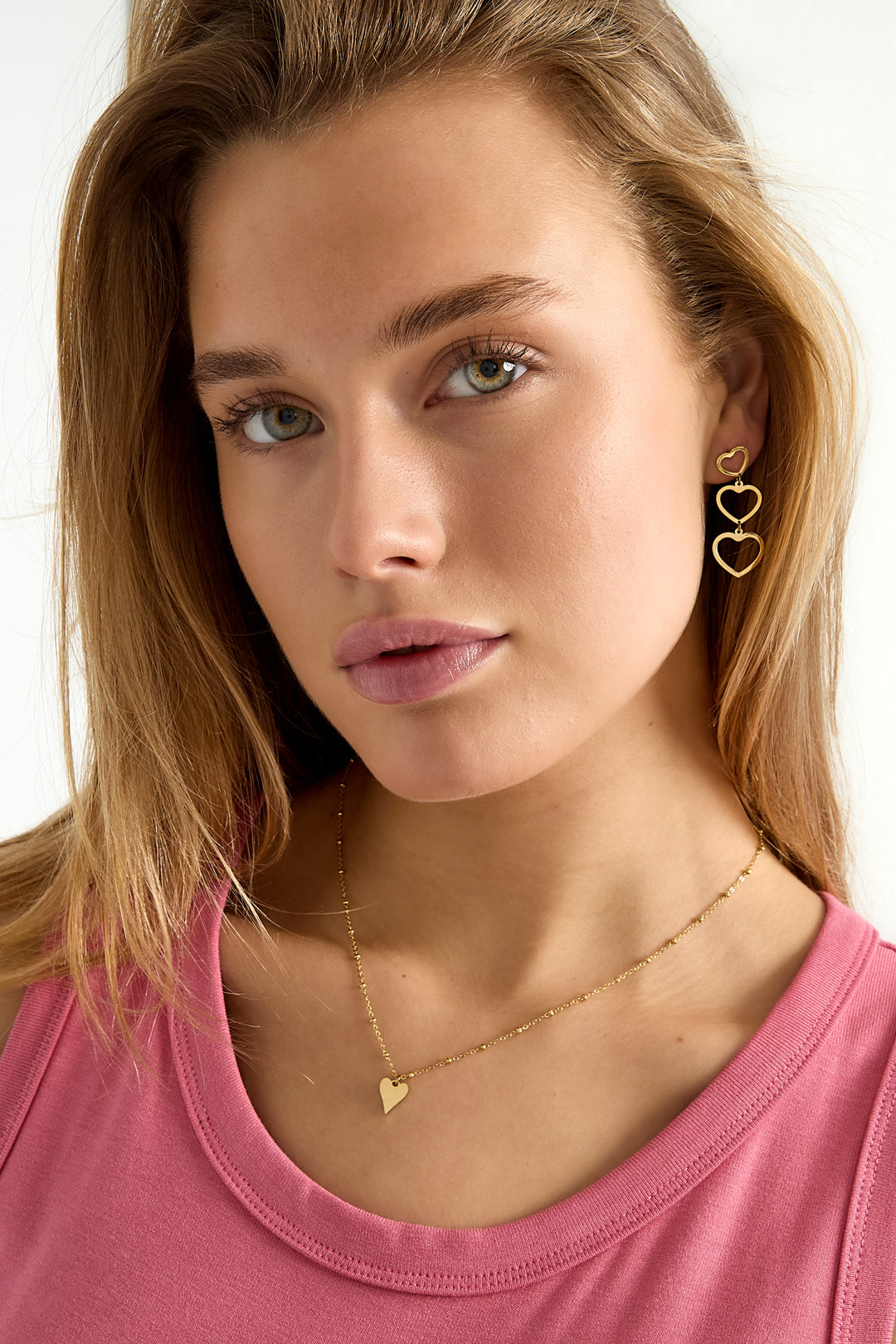 ketting met bolletjes en hartbedel