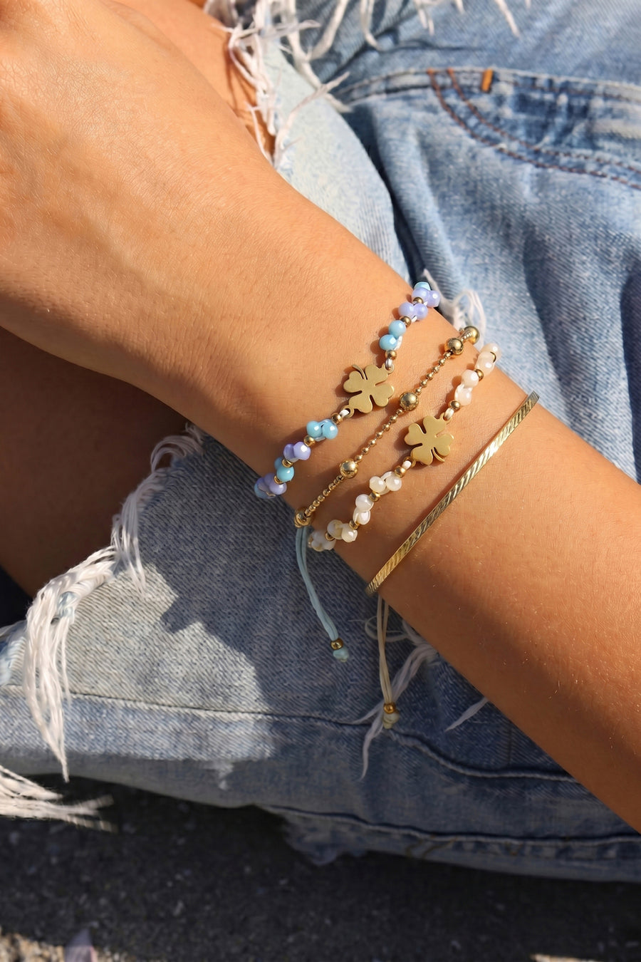 Bracelet tressé pour femmes en polyester, acier inoxydable, cristal avec motif trèfle – plusieurs coloris
