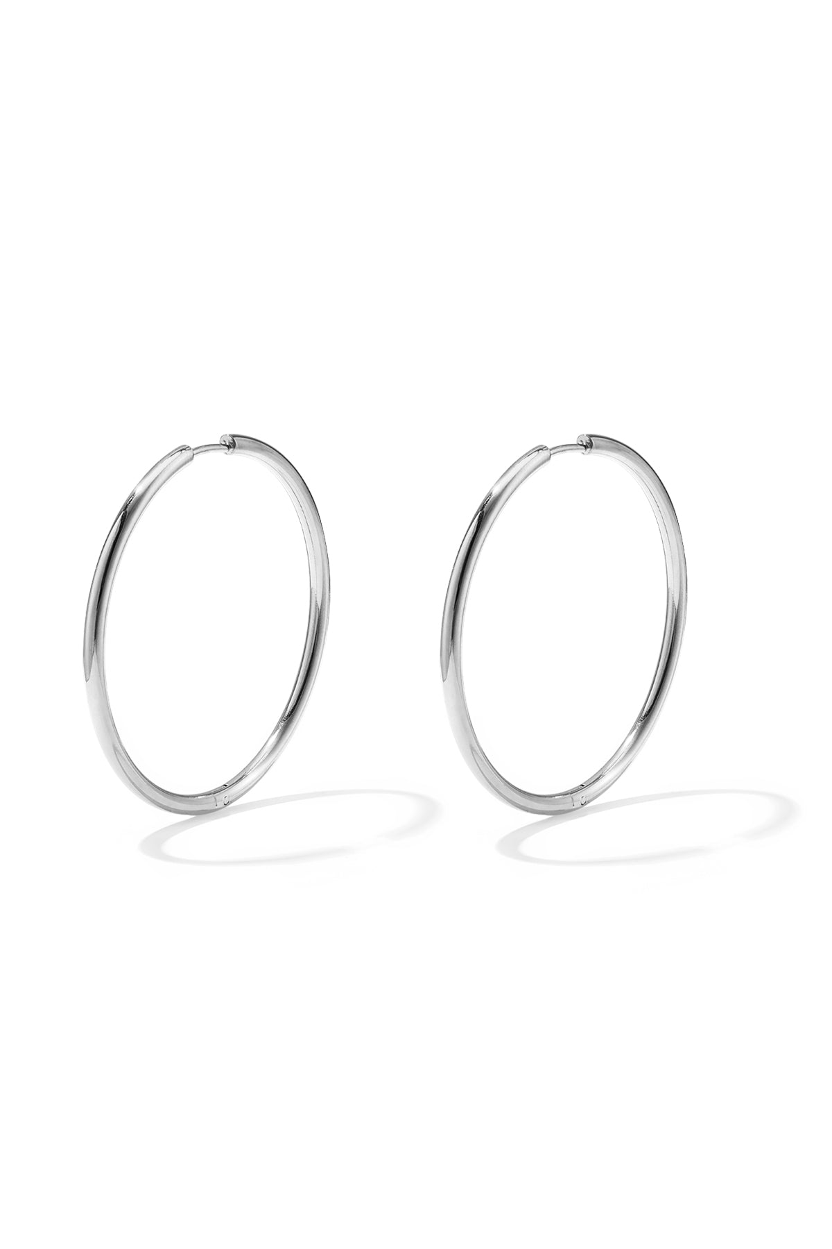 Boucles d'oreilles créoles pour femmes en acier inoxydable au design uni - couleur or