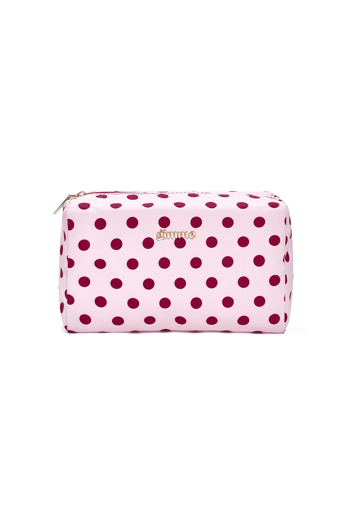 Make-uptasje met polkadots in lichtroze