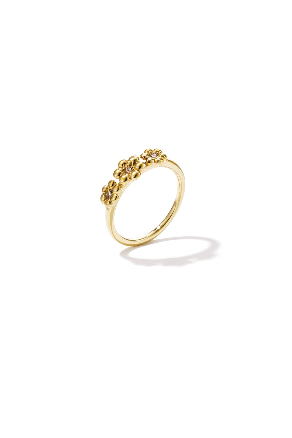 Ring met madeliefjes en steentjes