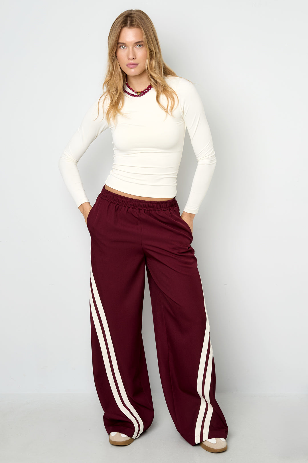 Dames sportieve gestreepte broek van polyester – productfoto 6