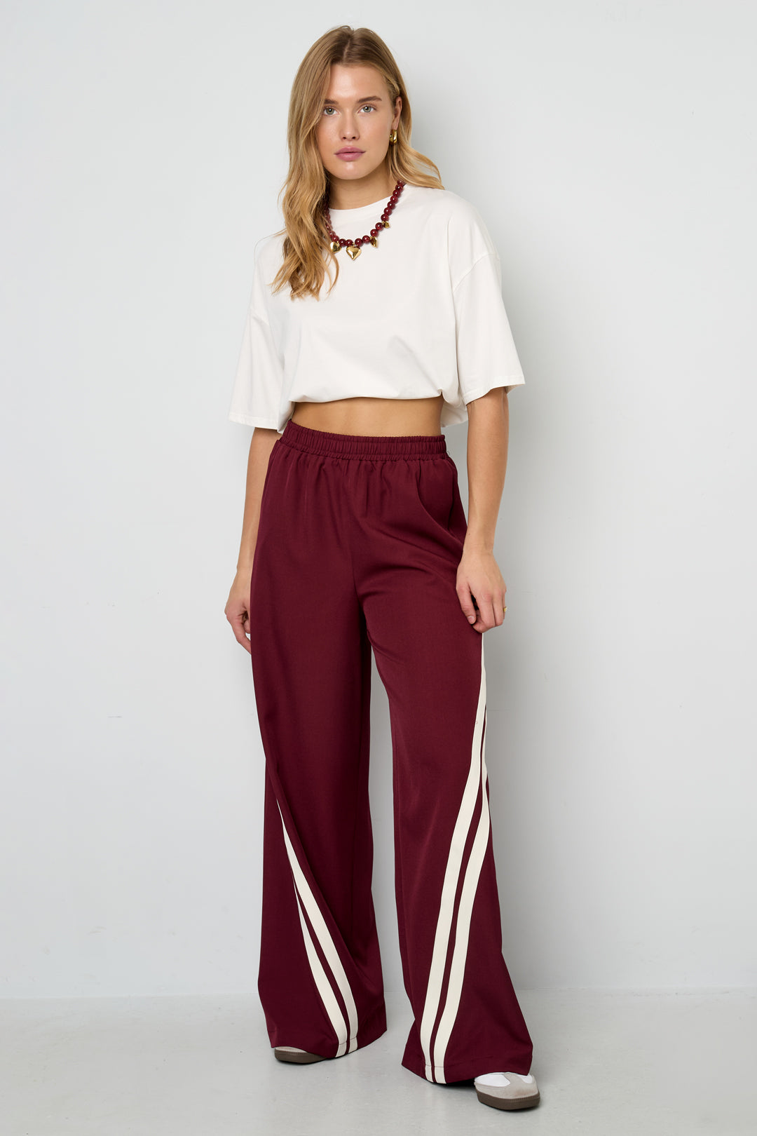 Dames sportieve gestreepte broek van polyester – productfoto 4