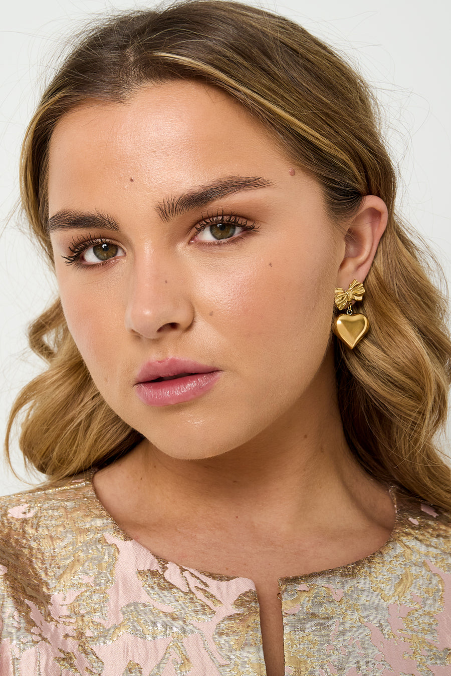 Boucles d'oreilles pendantes pour femmes en acier inoxydable avec cœur et nœud