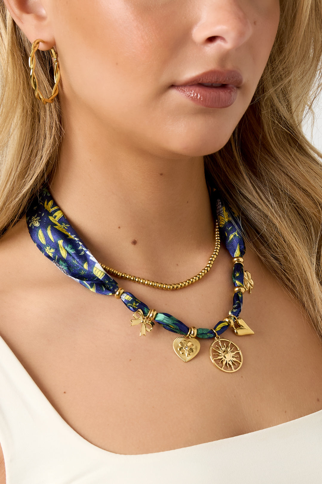 Braided stainless steel women's necklace with sun motif and heart shape - blue – image 3